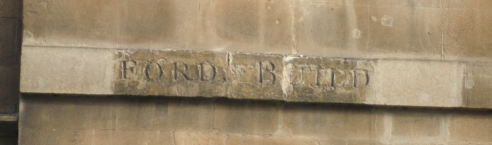 Image: weathered street sign for Axford's Buildings prior to restoration