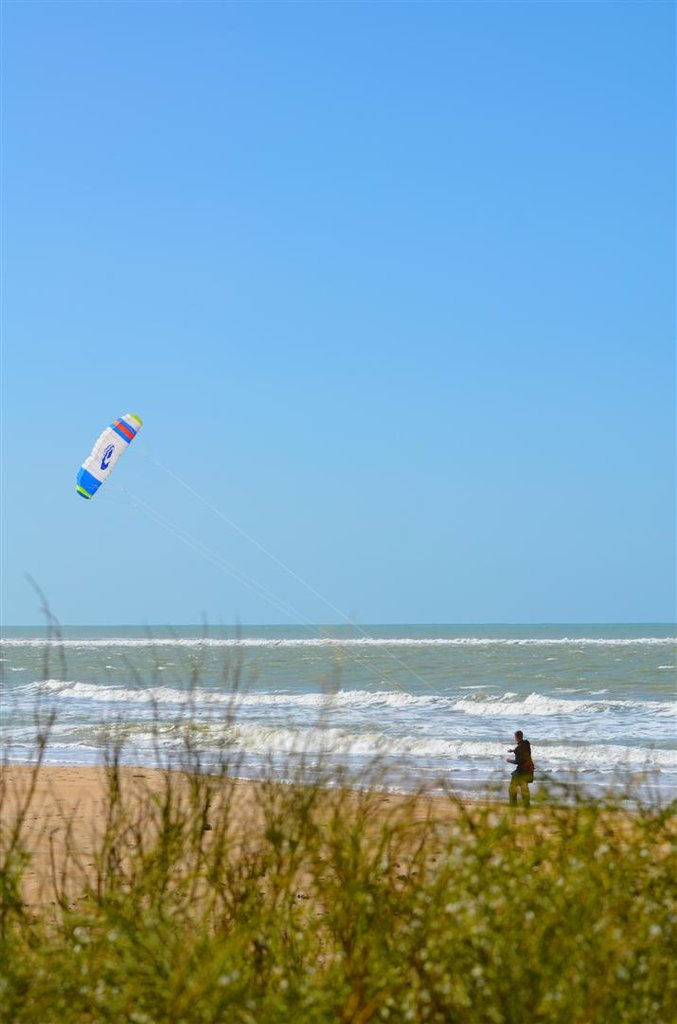 к̲la playa de Camposoto 