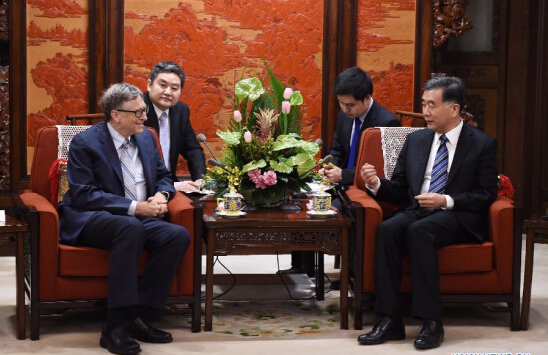 Chinese Vice Premier Wang Yang (R) meets with Bill Gates, founder and chairman of TerraPower