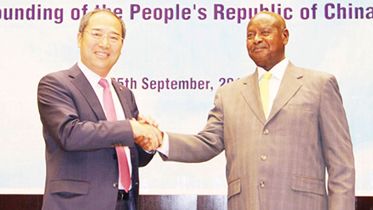 President Museveni and Chinese Ambassador to Uganda Zheng Zhuqiang